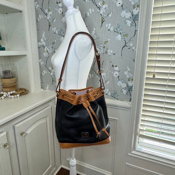Dooney and Bourke Black Leather Bucket Handbag with Brown Leather Trim - Picture 1 of 7